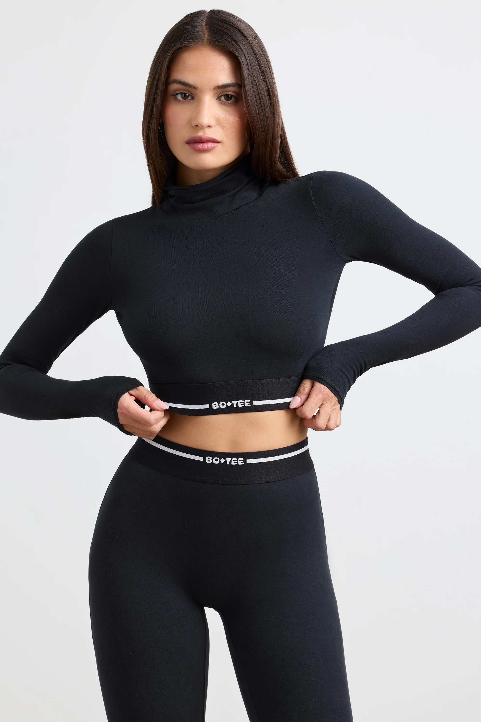 Backless Turtleneck Long-Sleeve Crop Top in Black - Image 6