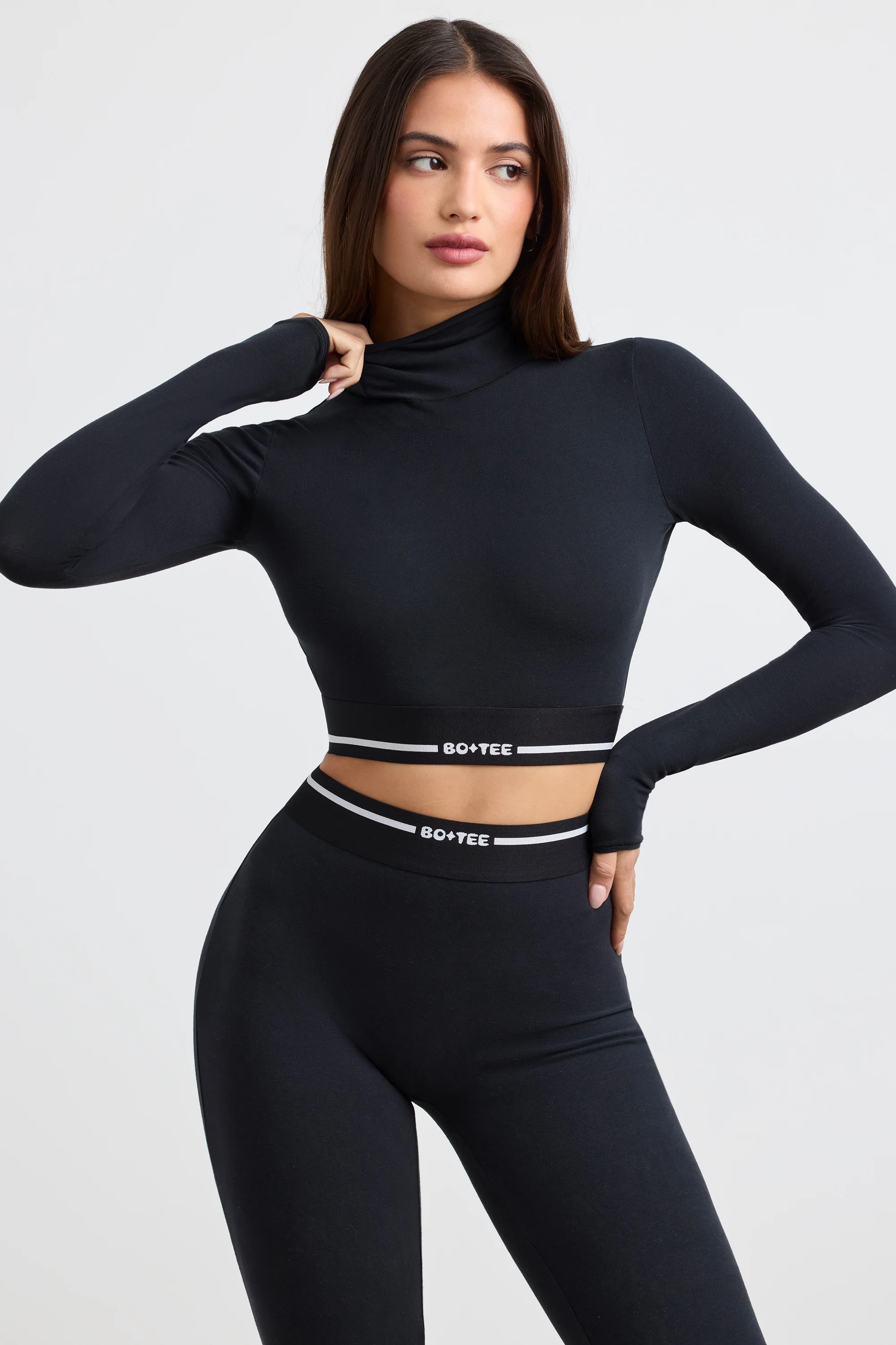 Backless Turtleneck Long-Sleeve Crop Top in Black - Image 7