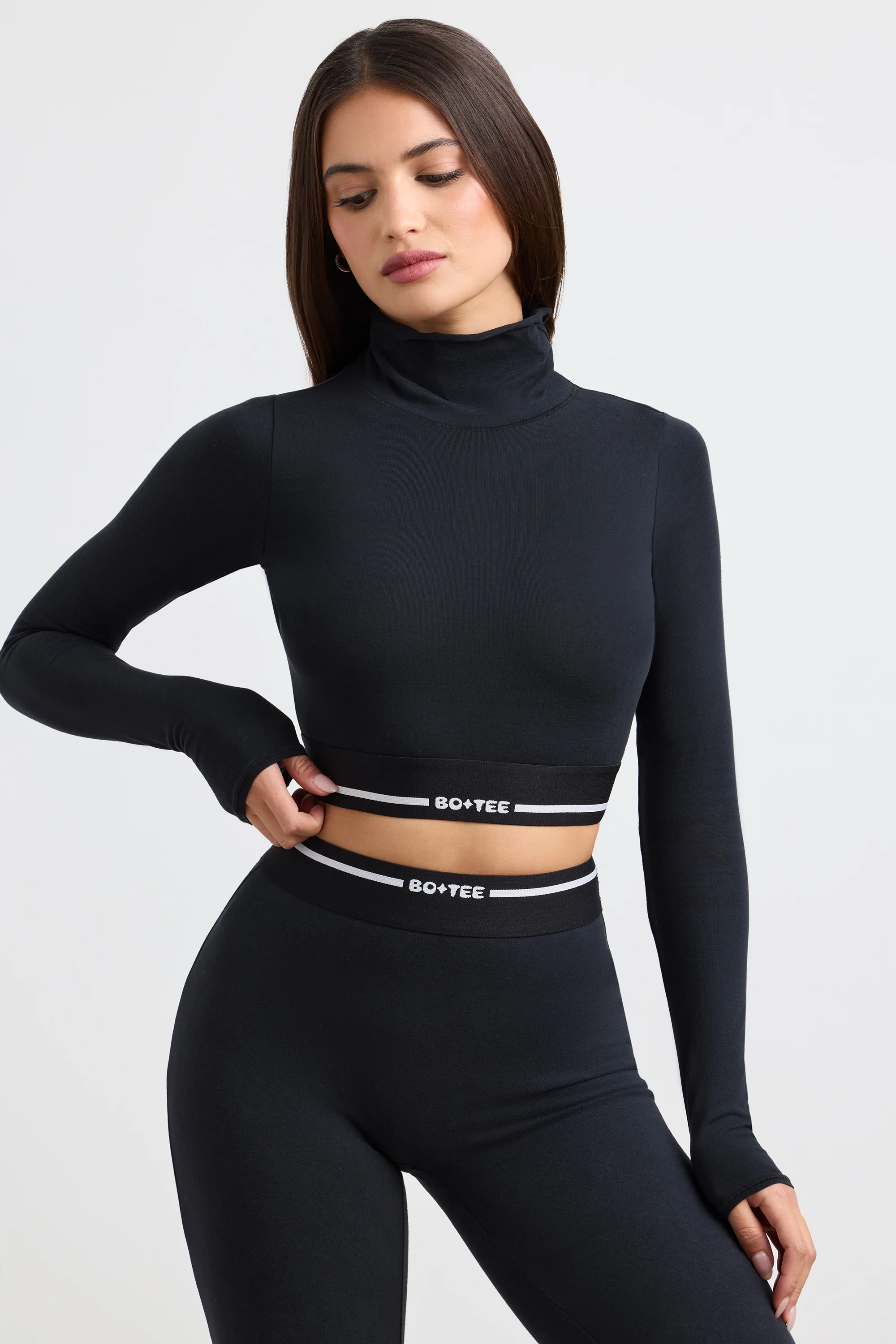 Backless Turtleneck Long-Sleeve Crop Top in Black - Image 8
