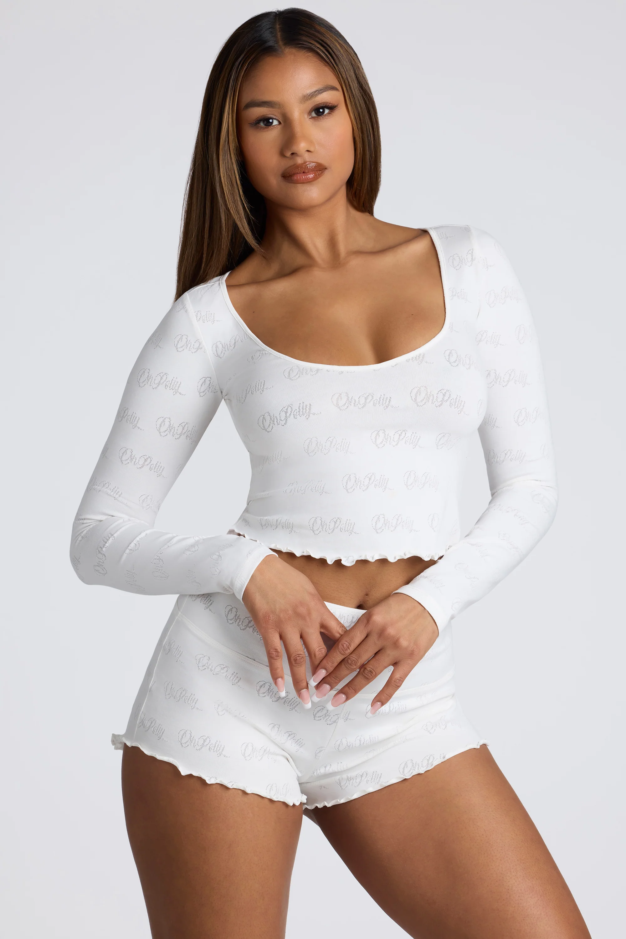 Long Sleeve Scoop Neck Pointelle Crop Top in White - Image 10