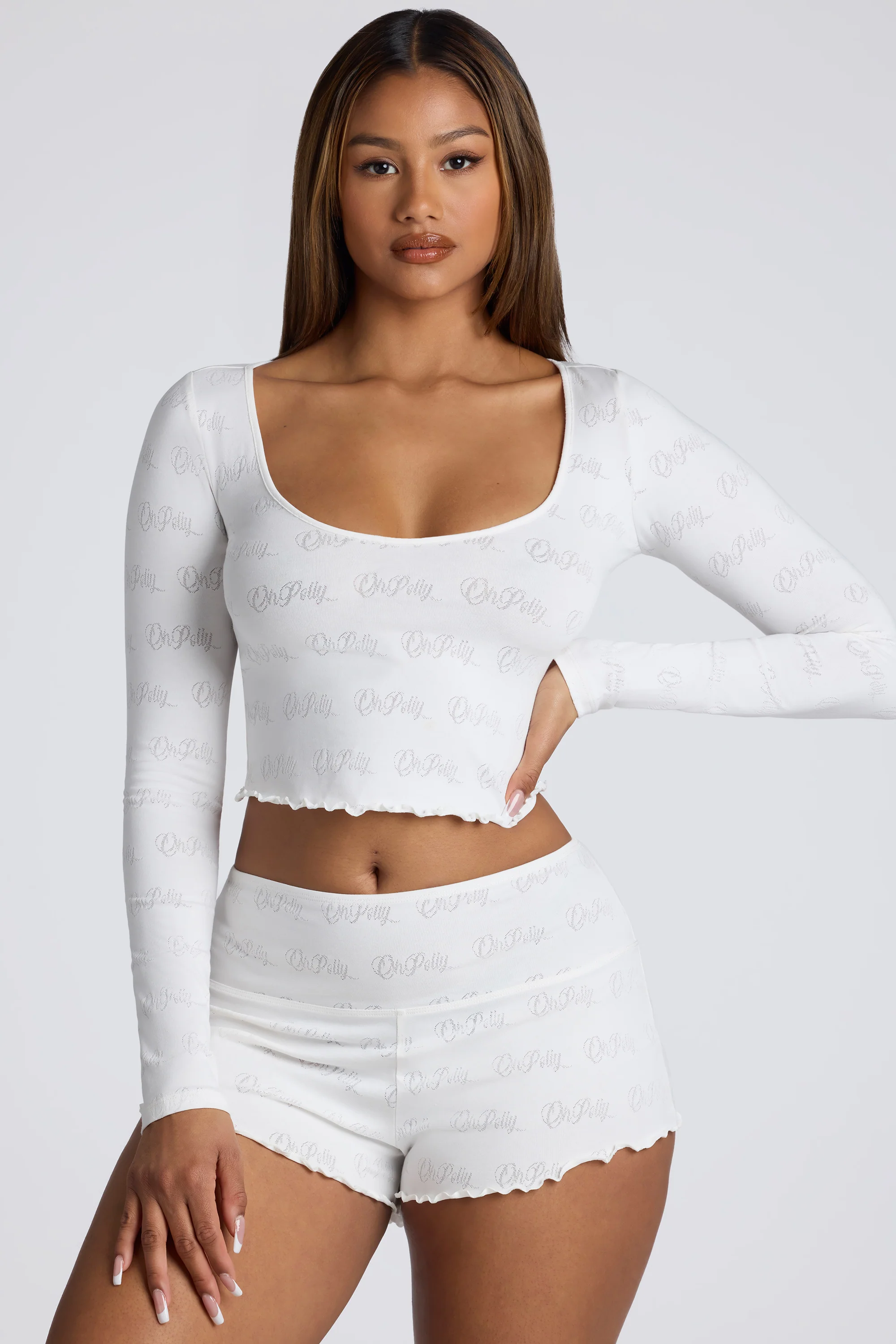 Long Sleeve Scoop Neck Pointelle Crop Top in White - Image 11