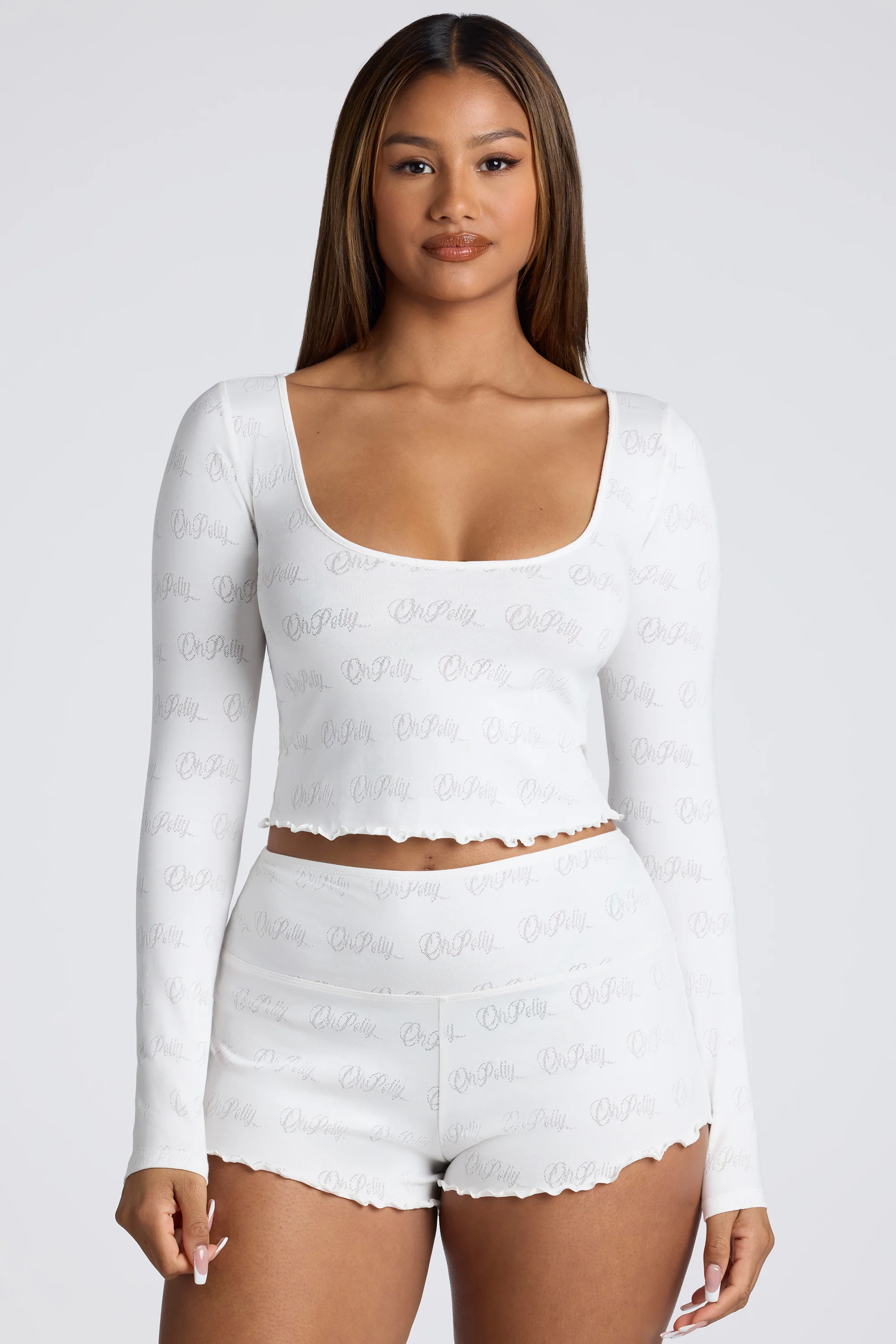 Long Sleeve Scoop Neck Pointelle Crop Top in White - Image 8