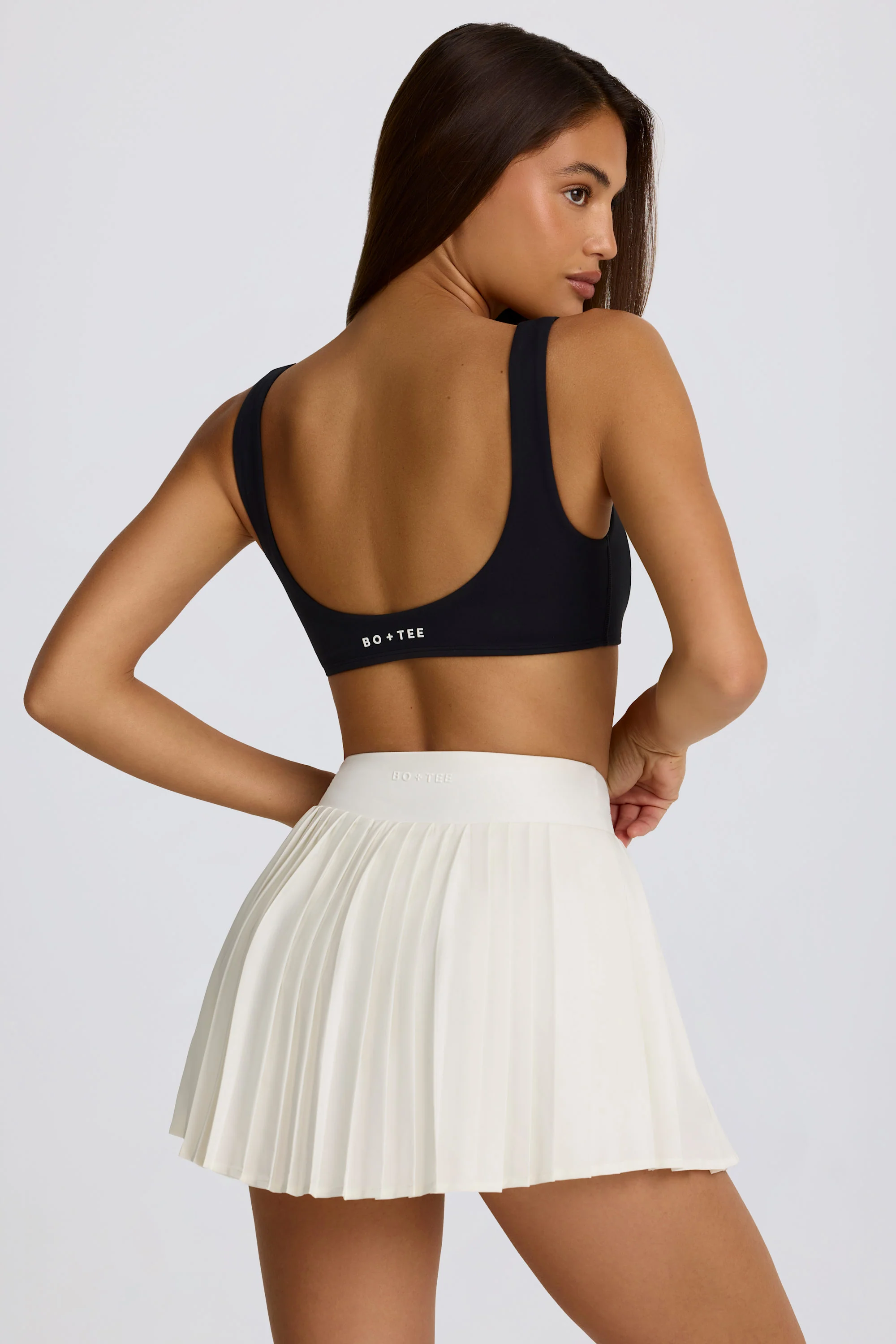 Soft Active Crossover Pleated Mini Skort in Coconut - Image 2