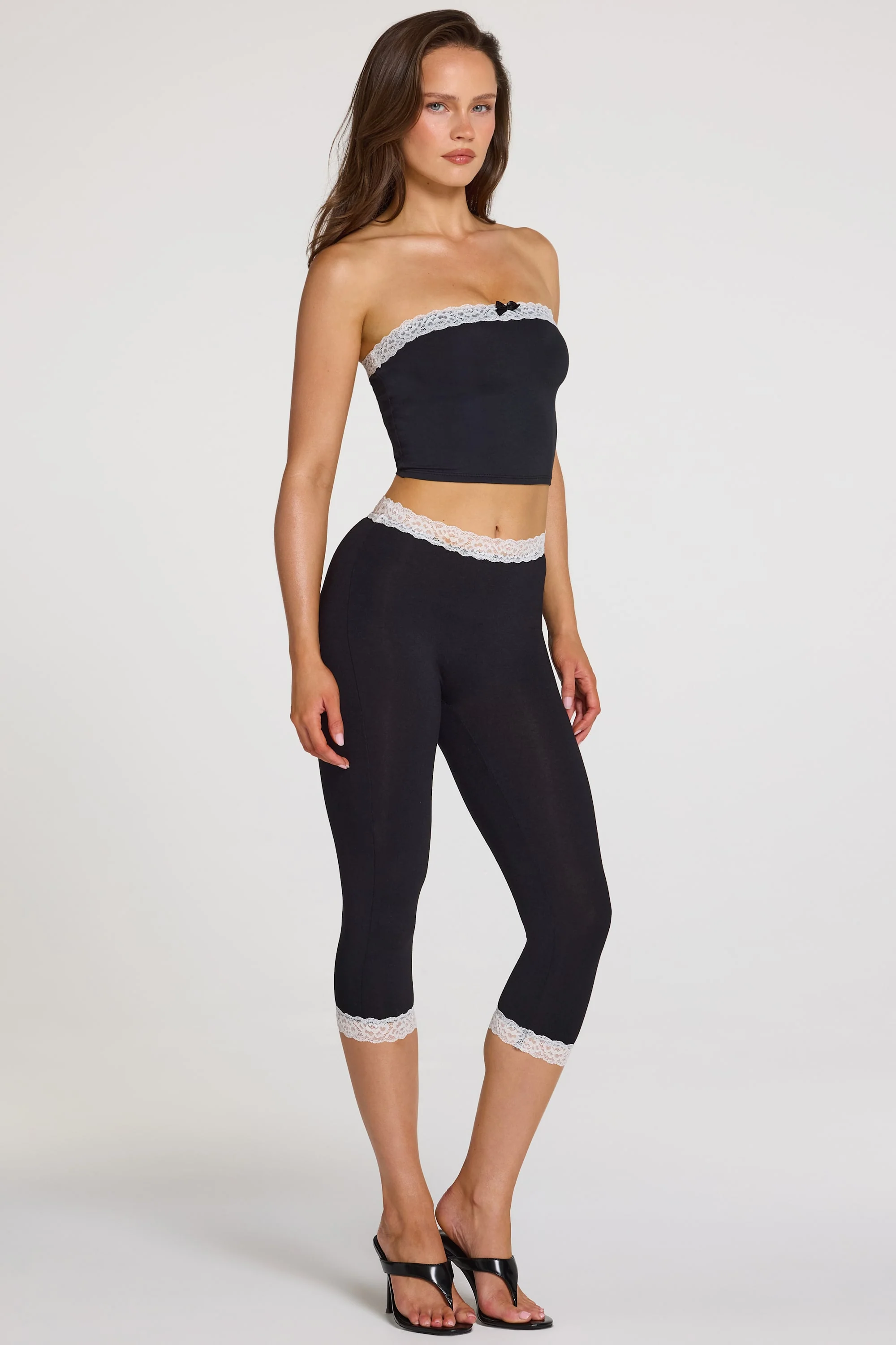 Modal Lace-Trim Mid-Rise Capri Leggings in Black - Image 9